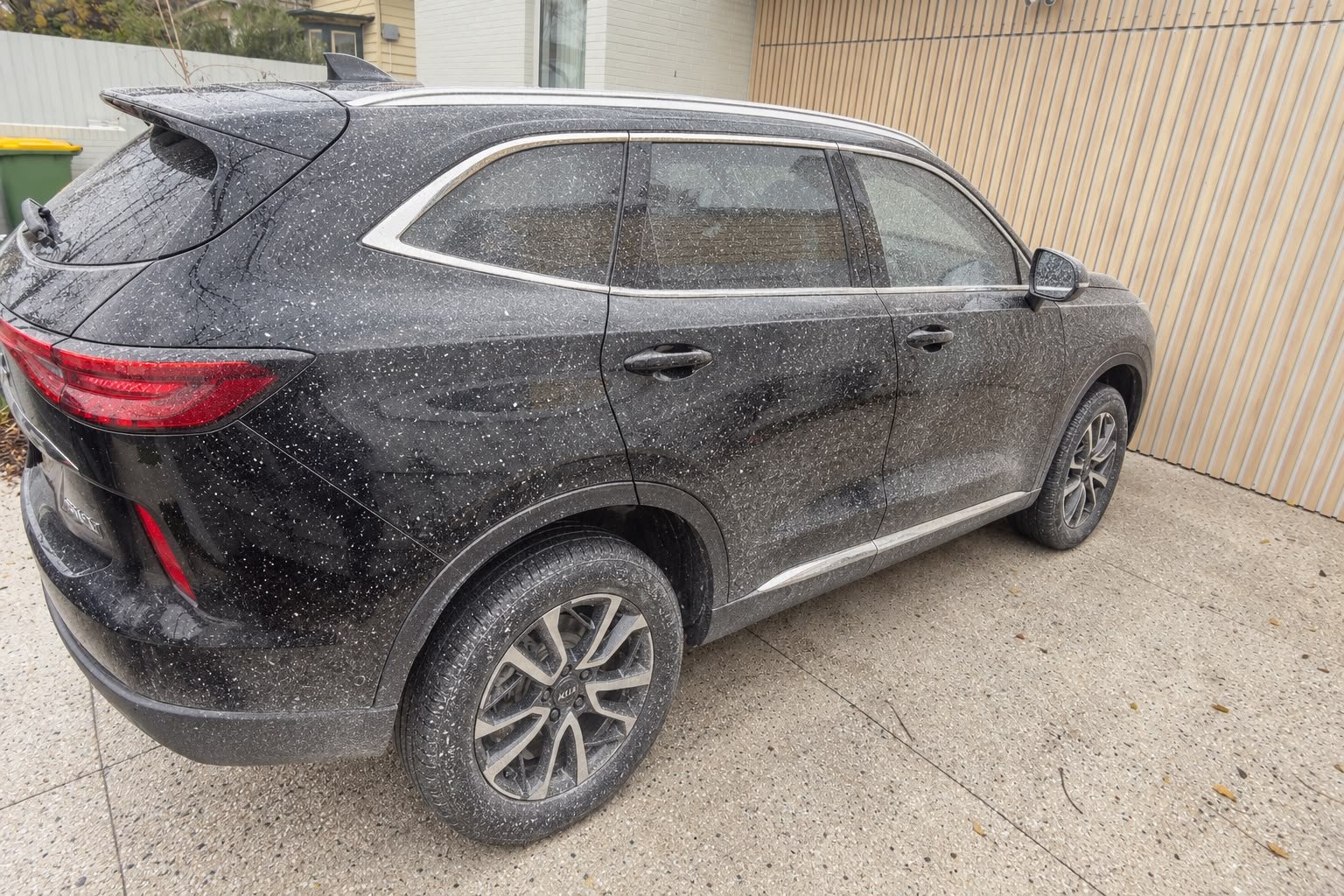 Car before paint overspray removal